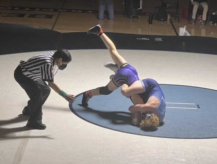 Boys wrestling pins for the win – The Olympus