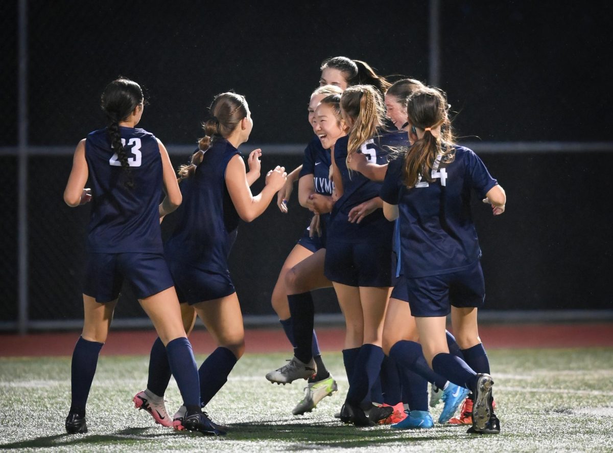 The Bears celebrate a goal against Capital. Photo courtesy of Stephanie Norton Photography.