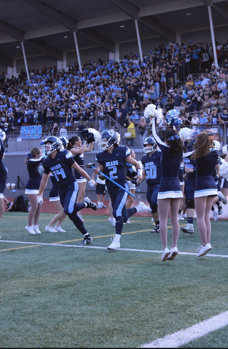 Bears enter a packed Ingersoll Stadium with Quarterback Cameron Downing leading the team.