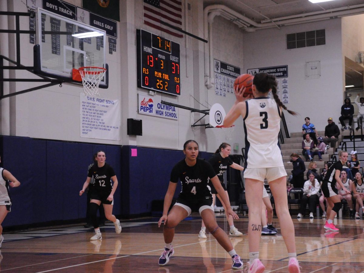 Senior captain Lauren Wolin shoots from behind the three point line against Sumner last Saturday. Photo by Jonah Song.
