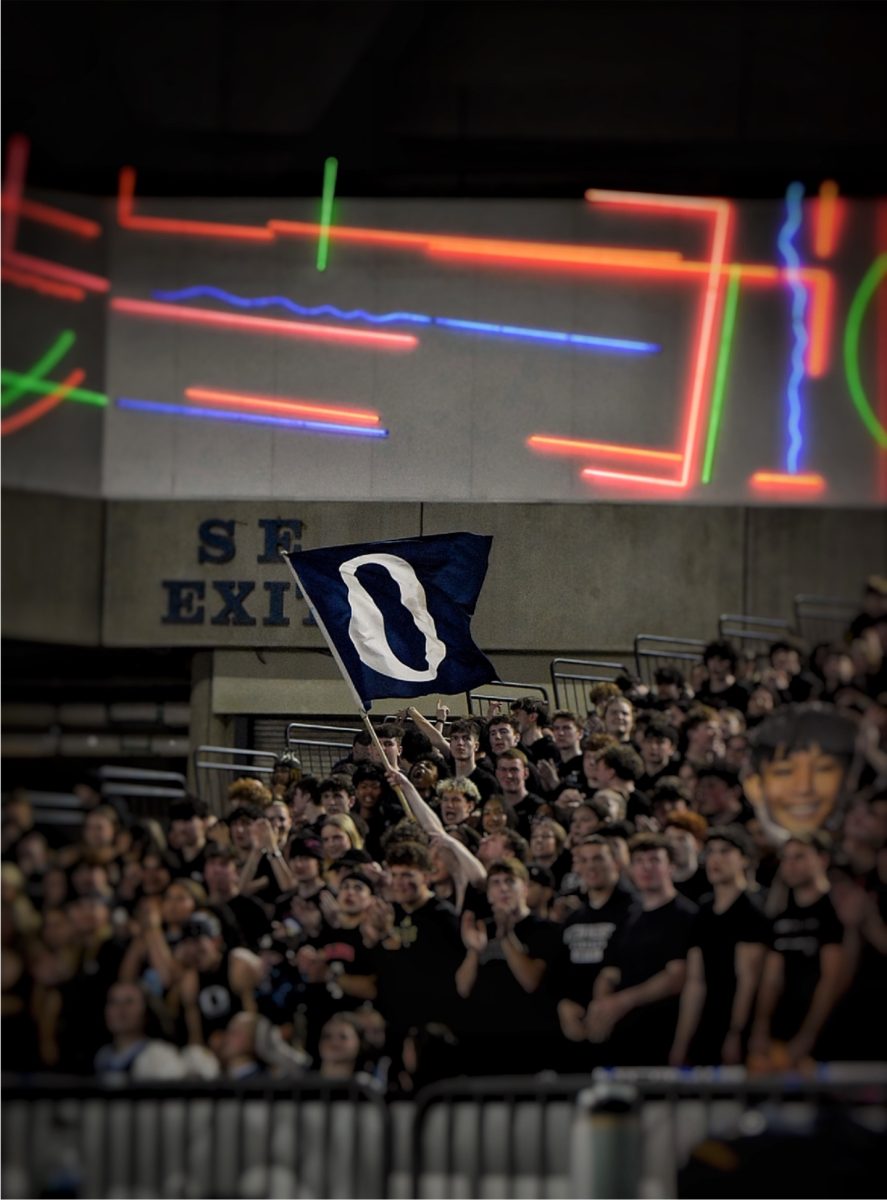 Numbering roughly 500, the Olympia student section is pictured supporting their game against Auburn. Photo by Caleb Wilson.