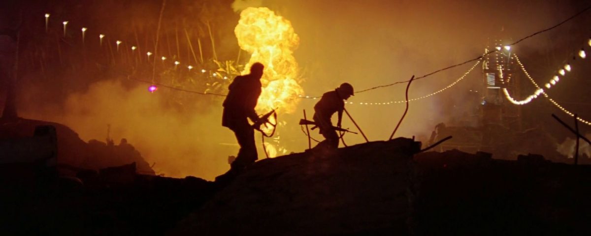 Captain Willard and Lance venturing across the hellish fields of Do Lung Bridge.